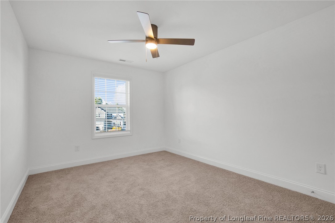 448 Pittfield Run Cameron, NC 28326 - Photo 23 of 43 an empty room with a window
