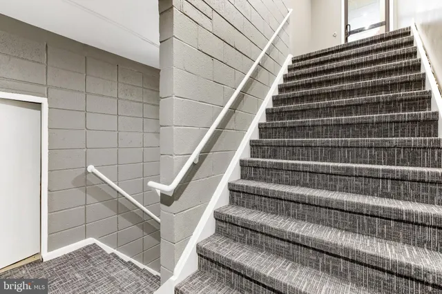 a view of entryway with a front door
