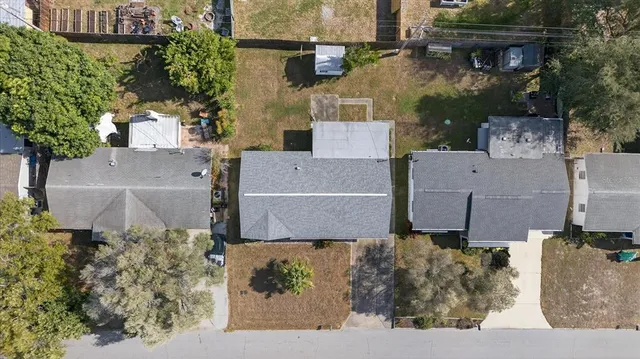 an aerial view of a house with a garden