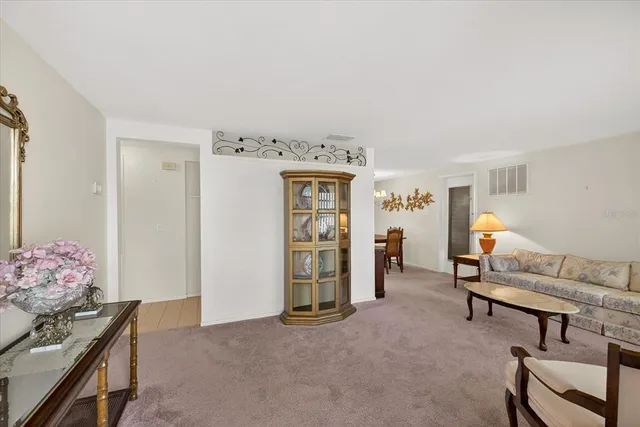 a livingroom with furniture and window