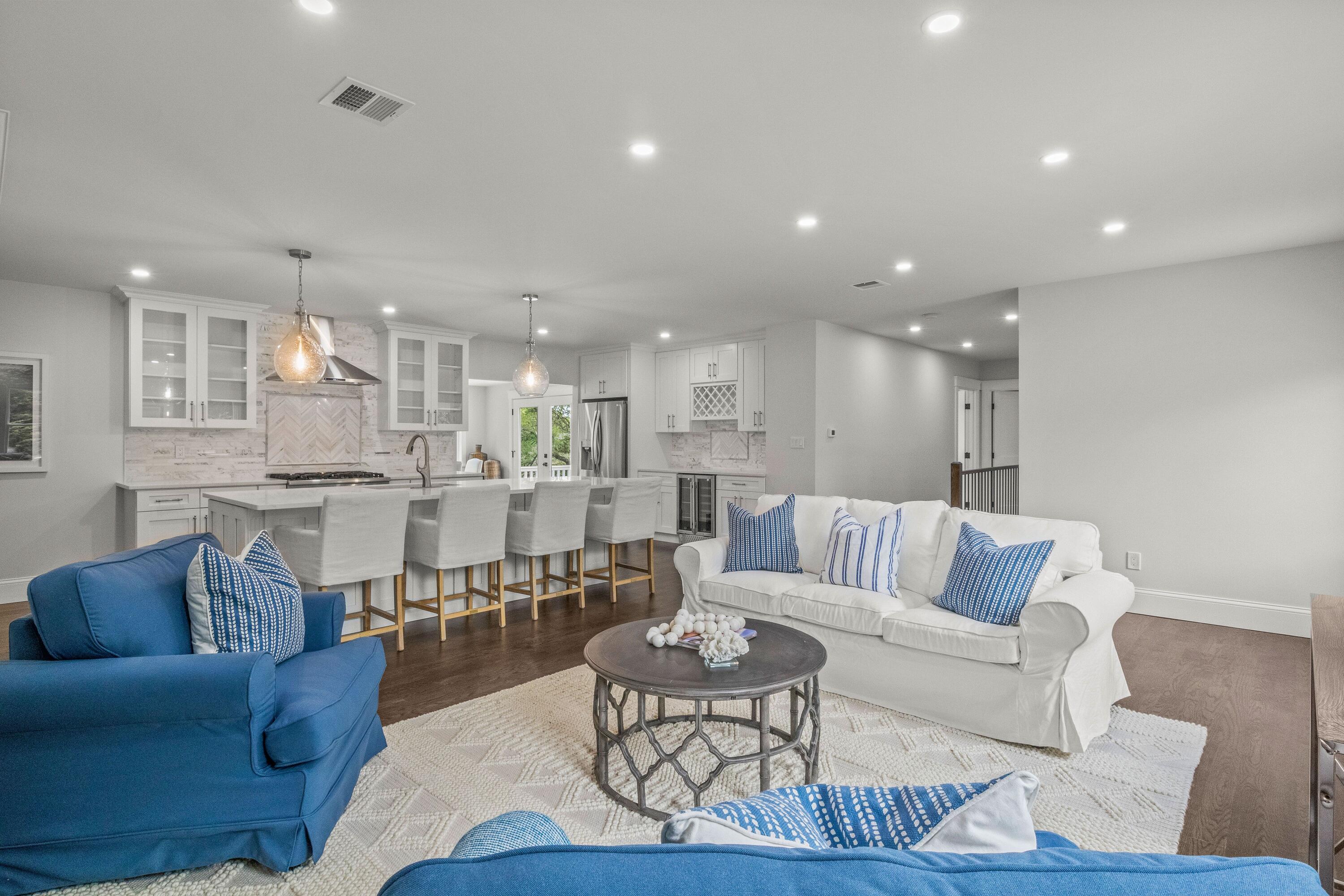 5 Locust Grove Road Harwich, MA 02645 - Photo 12 of 39 a living room with furniture kitchen and a table