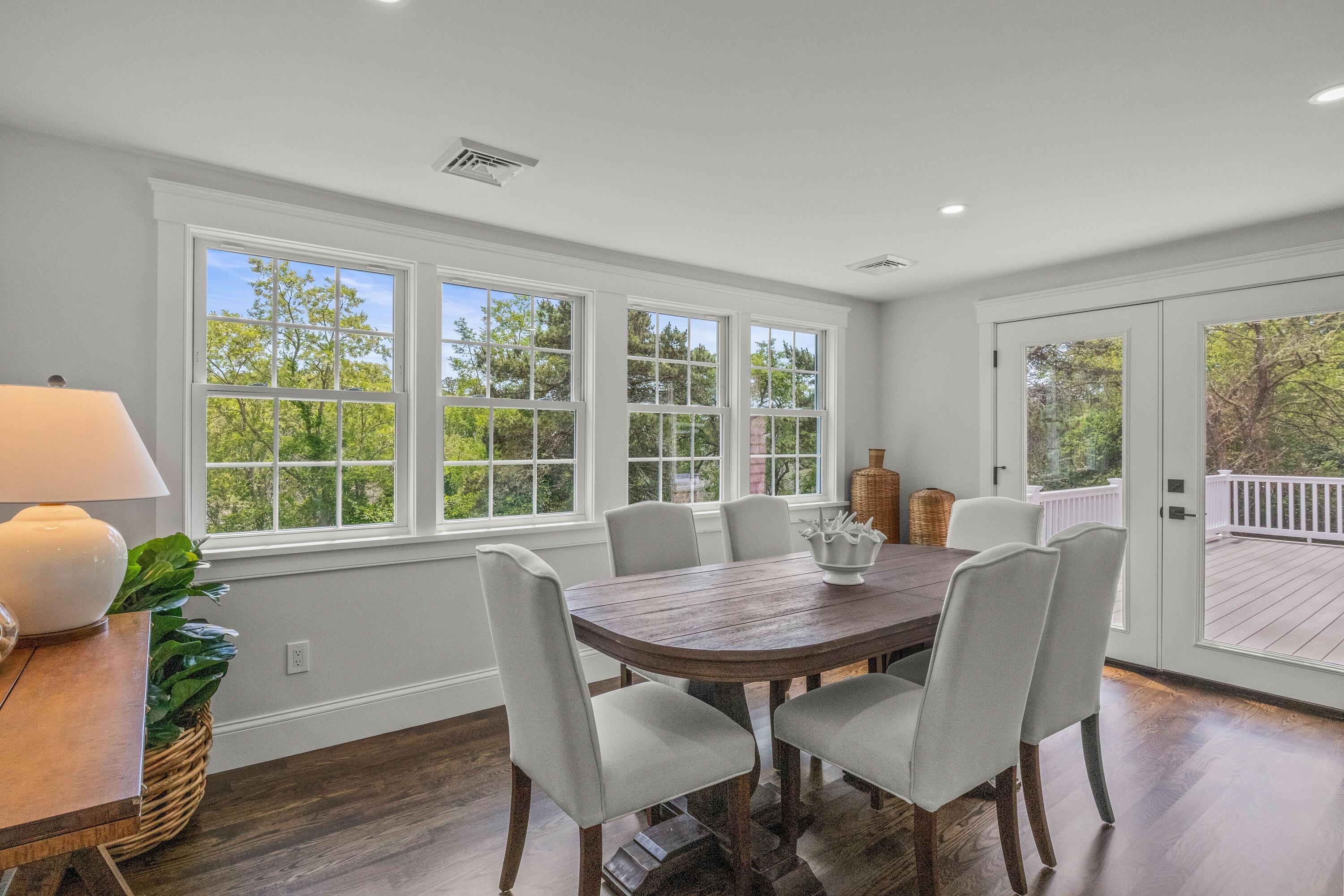 5 Locust Grove Road Harwich, MA 02645 - Photo 21 of 39 a view of a dining room with furniture window and wooden floor