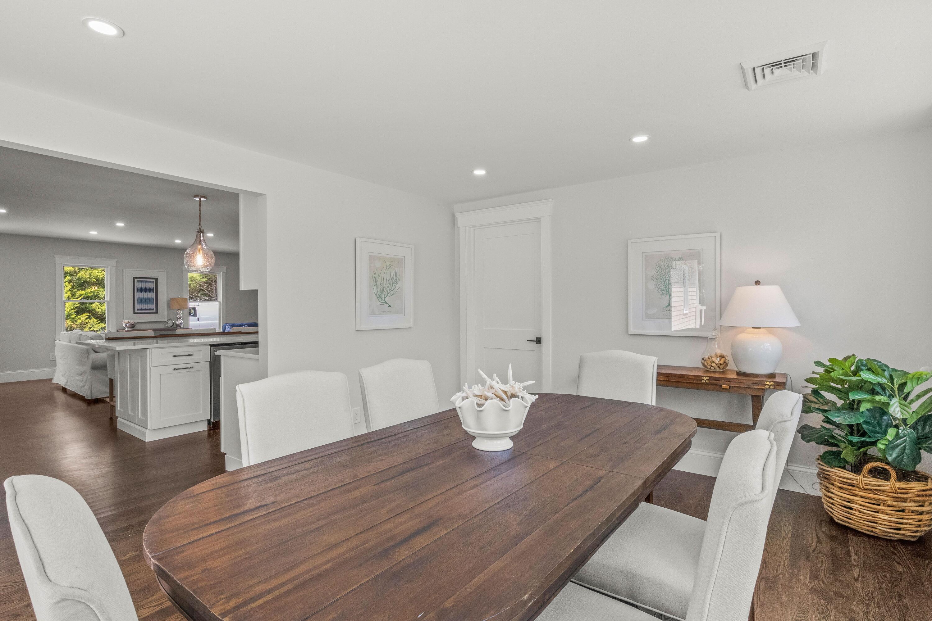 5 Locust Grove Road Harwich, MA 02645 - Photo 22 of 39 a view of a dining room with furniture and wooden floor