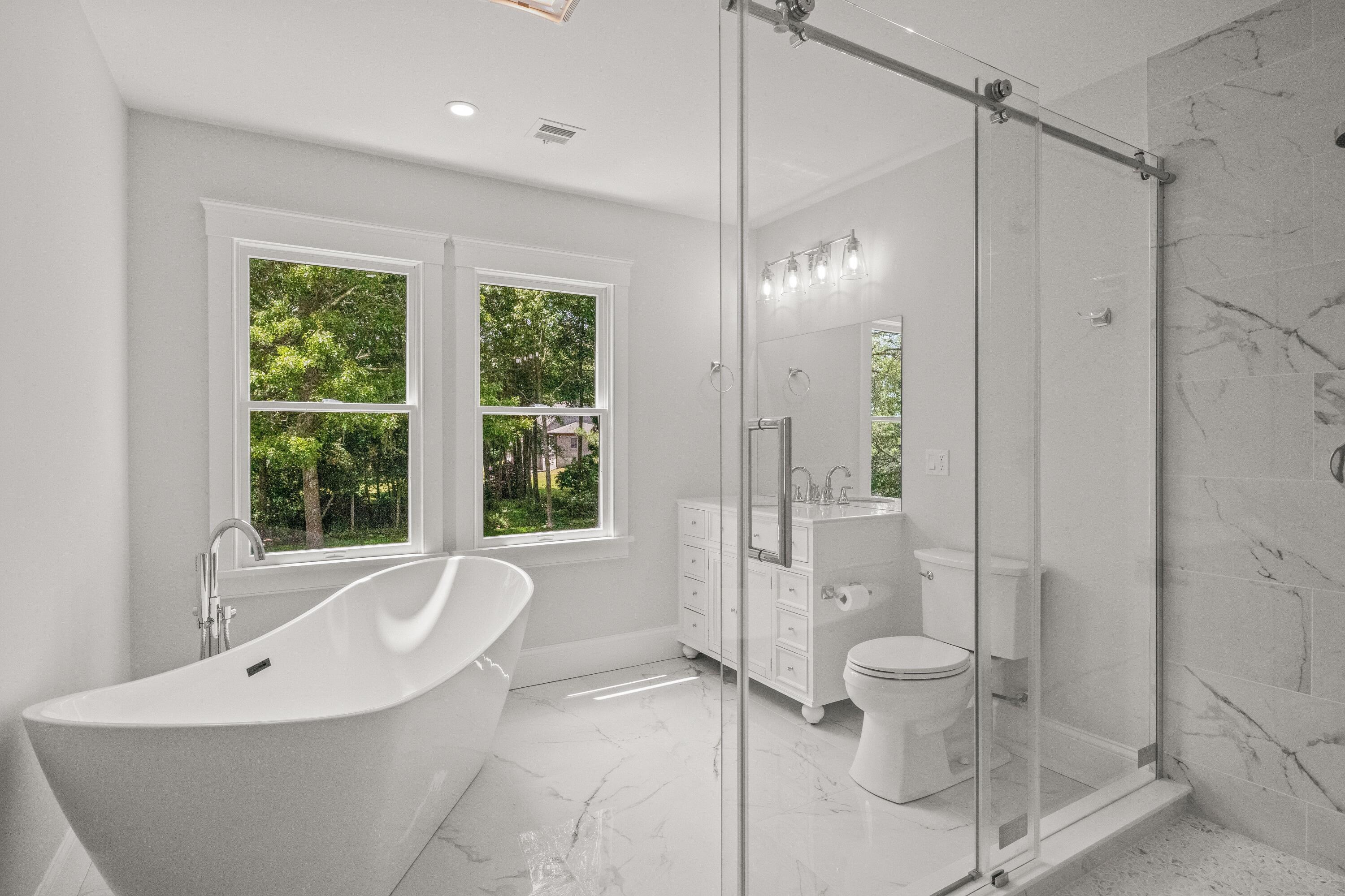 5 Locust Grove Road Harwich, MA 02645 - Photo 25 of 39 a bathroom with a bathtub and a shower