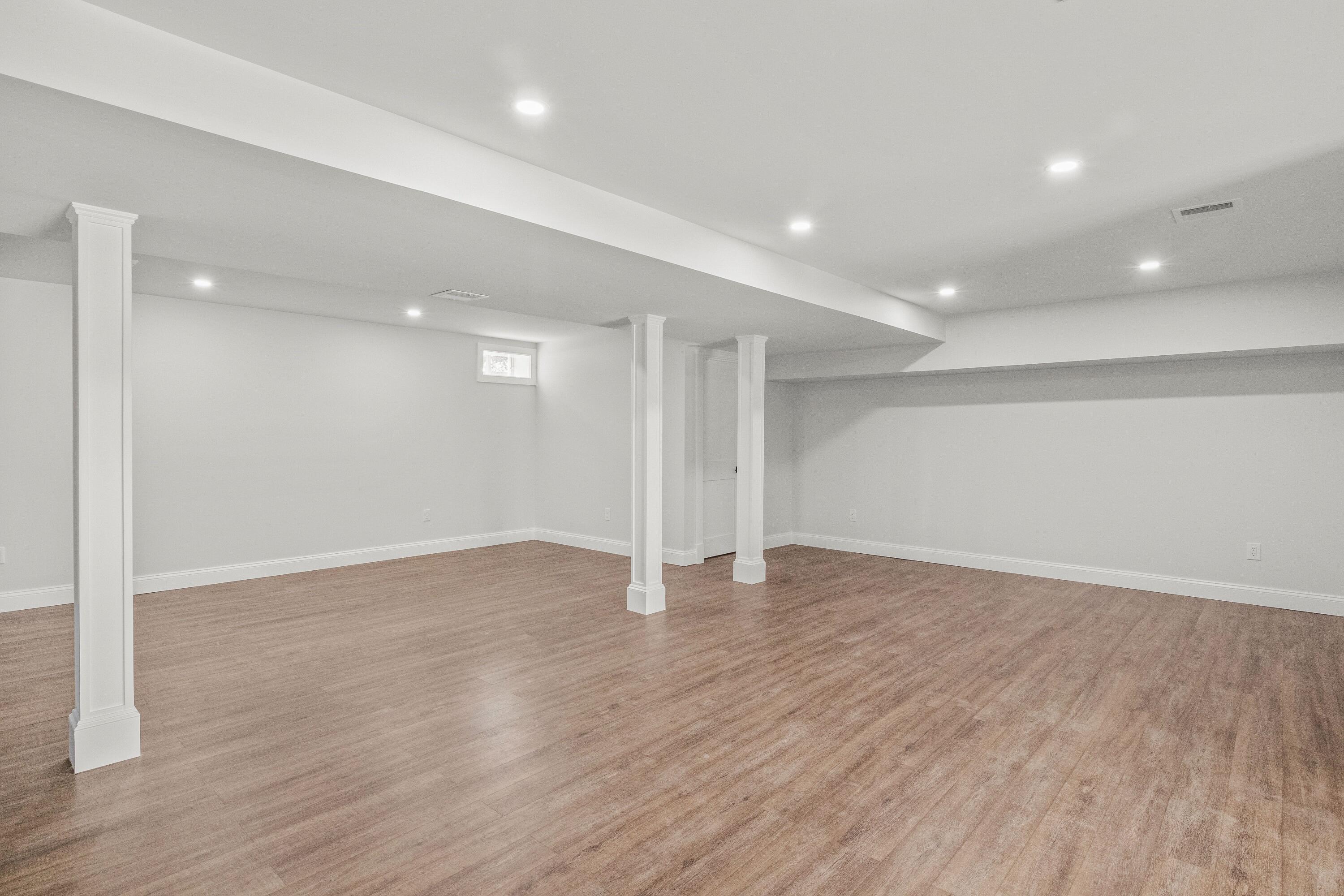 5 Locust Grove Road Harwich, MA 02645 - Photo 27 of 39 a view of an empty room with wooden floor