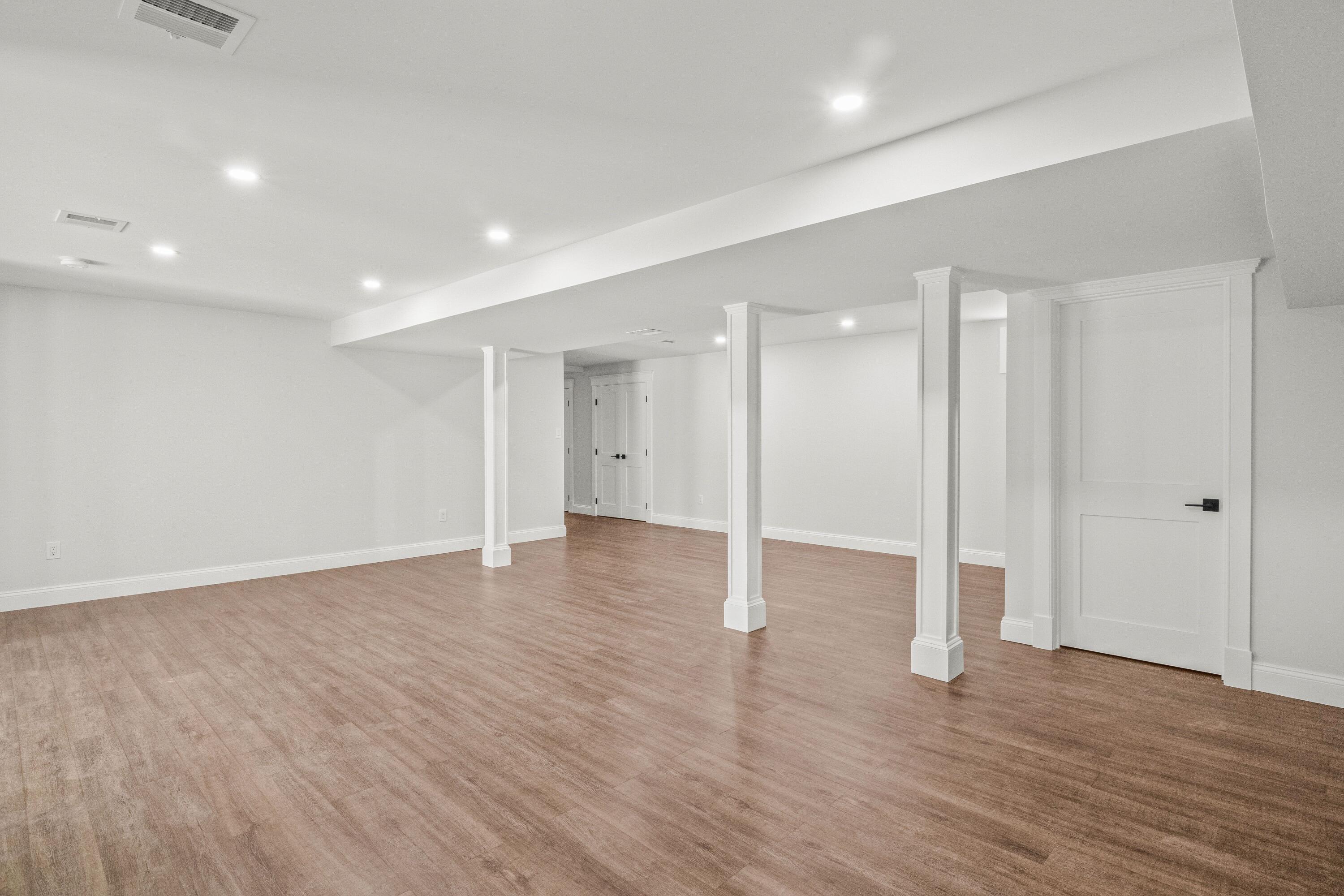 5 Locust Grove Road Harwich, MA 02645 - Photo 28 of 39 a view of an empty room with wooden floor