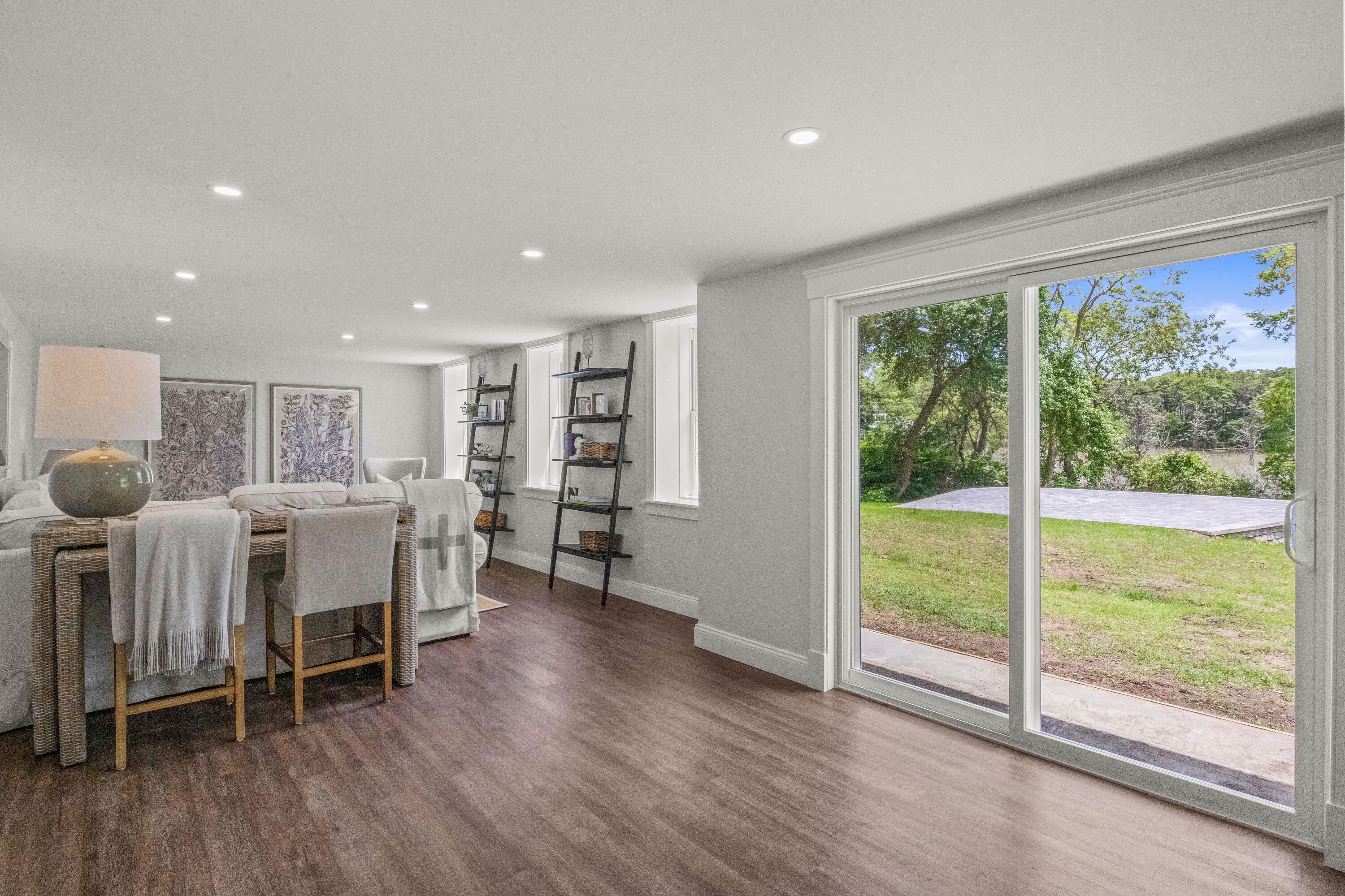 5 Locust Grove Road Harwich, MA 02645 - Photo 31 of 39 a view of a room with furniture and wooden floor