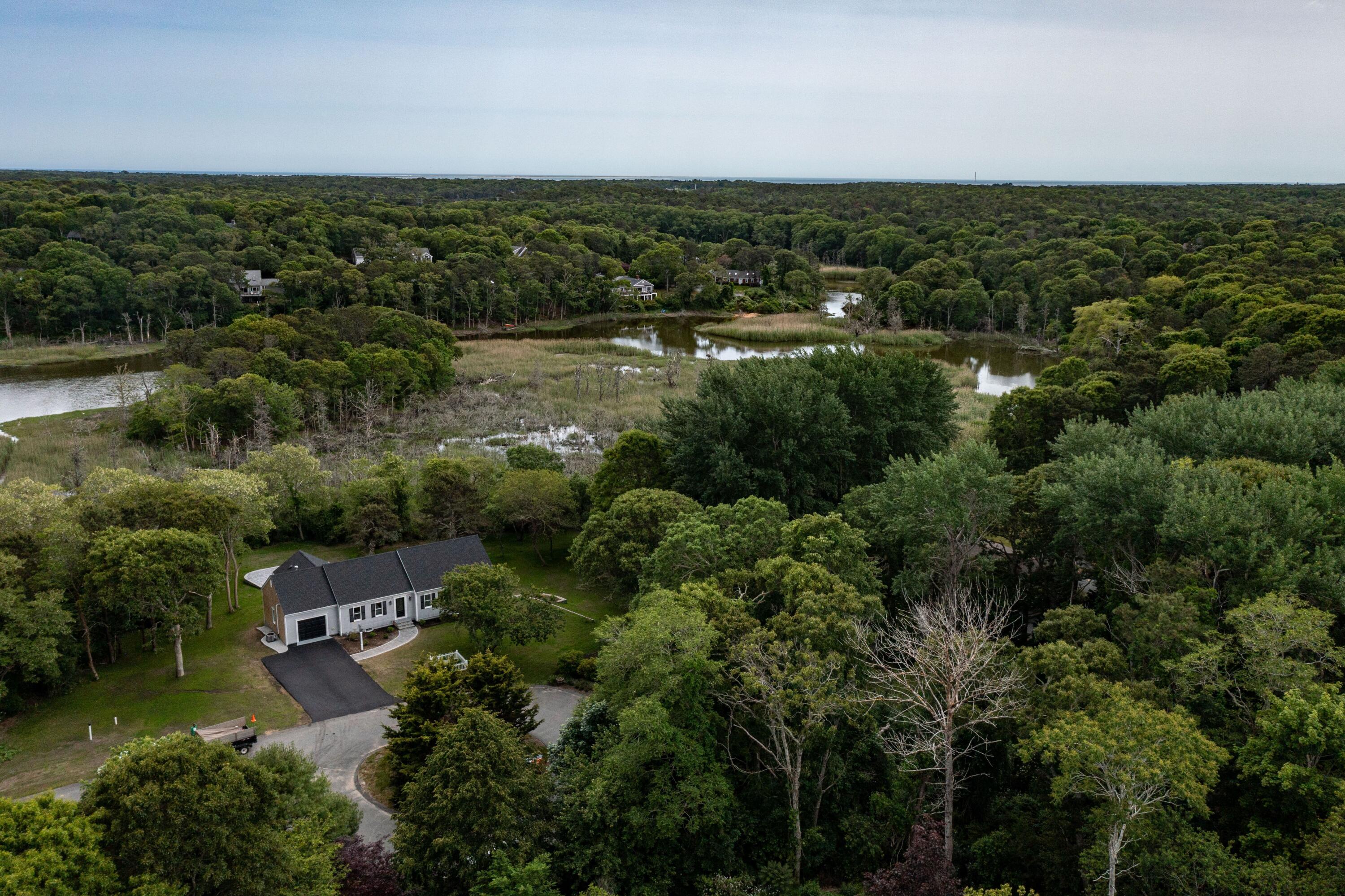 5 Locust Grove Road Harwich, MA 02645 - Photo 36 of 39 an aerial view of residential houses with outdoor space and trees