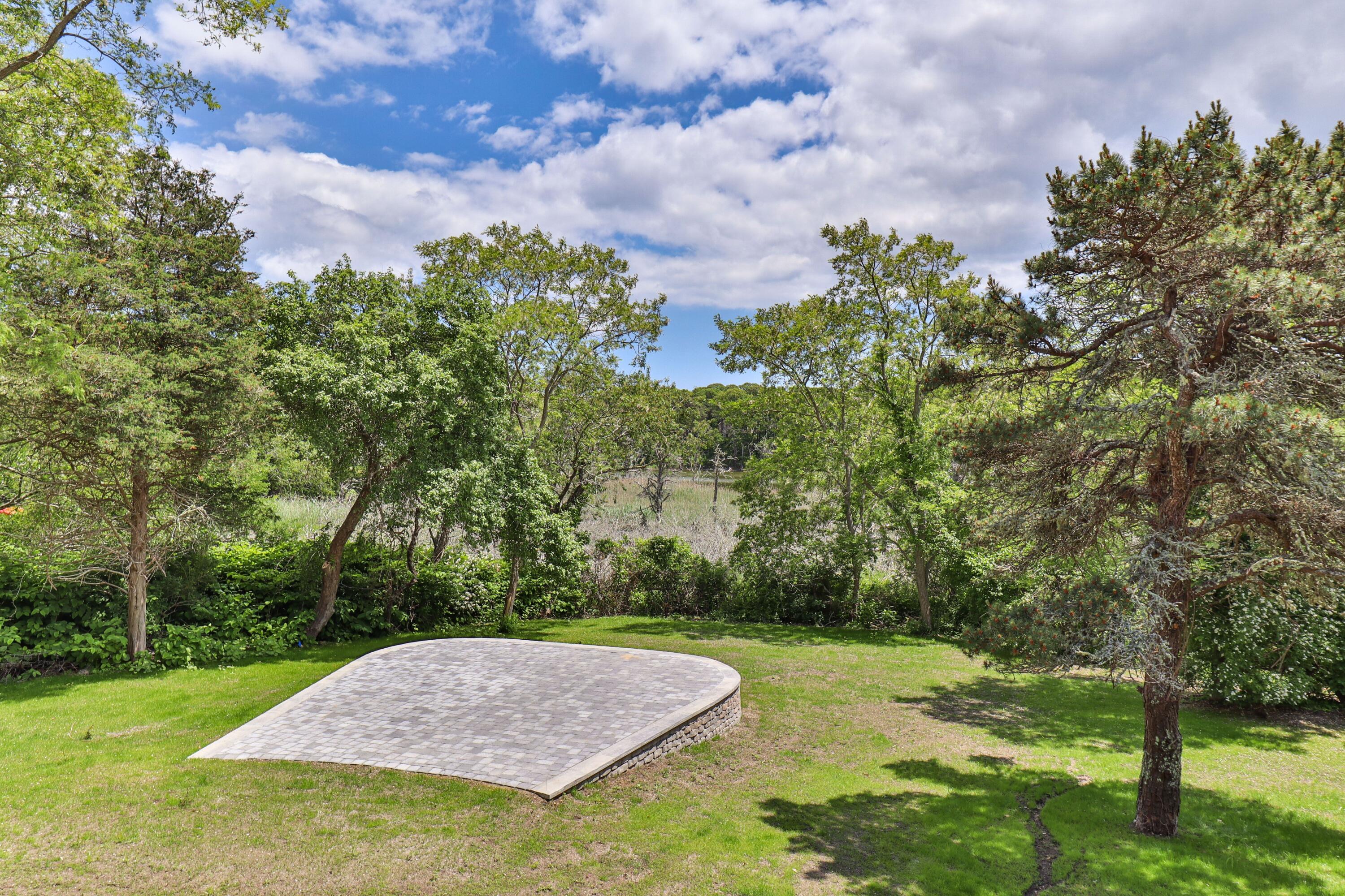 5 Locust Grove Road Harwich, MA 02645 - Photo 6 of 39 a view of a backyard