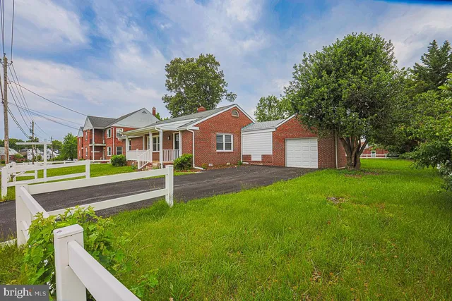 a house view with a garden space
