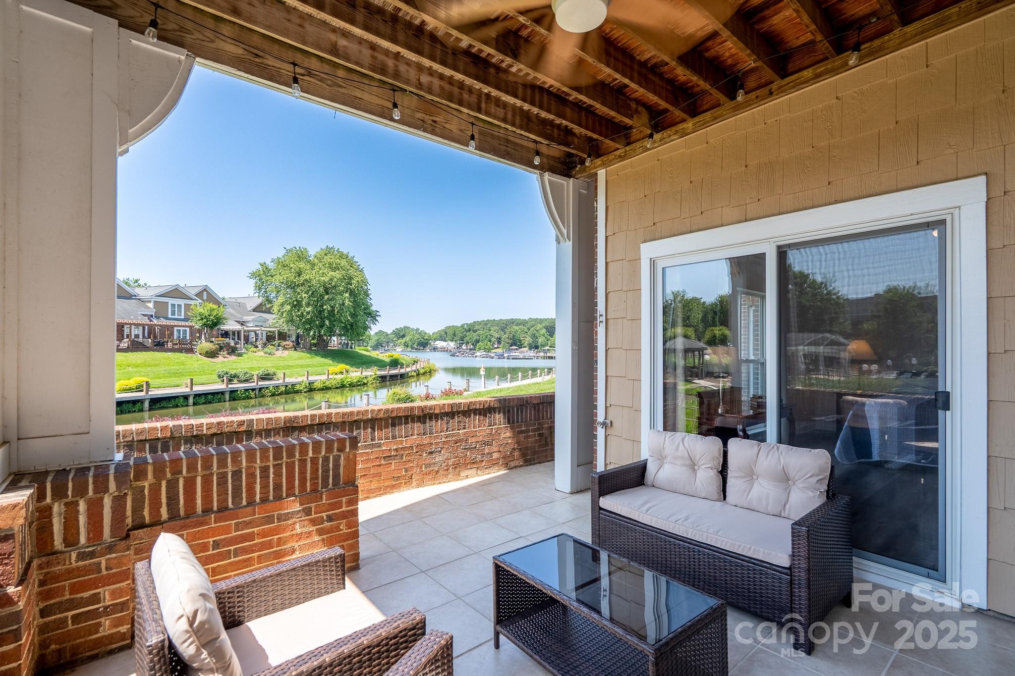 a outdoor living space with patio furniture and a potted plant
