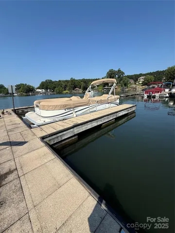 a view of balcony with two chairs and a table