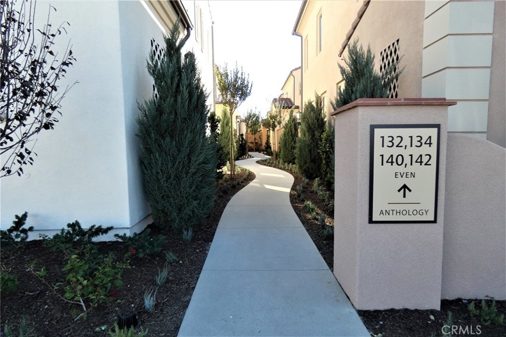 142 Anthology Irvine, CA 92618 - Photo 1 of 40 a view of a house with a sign on the wall