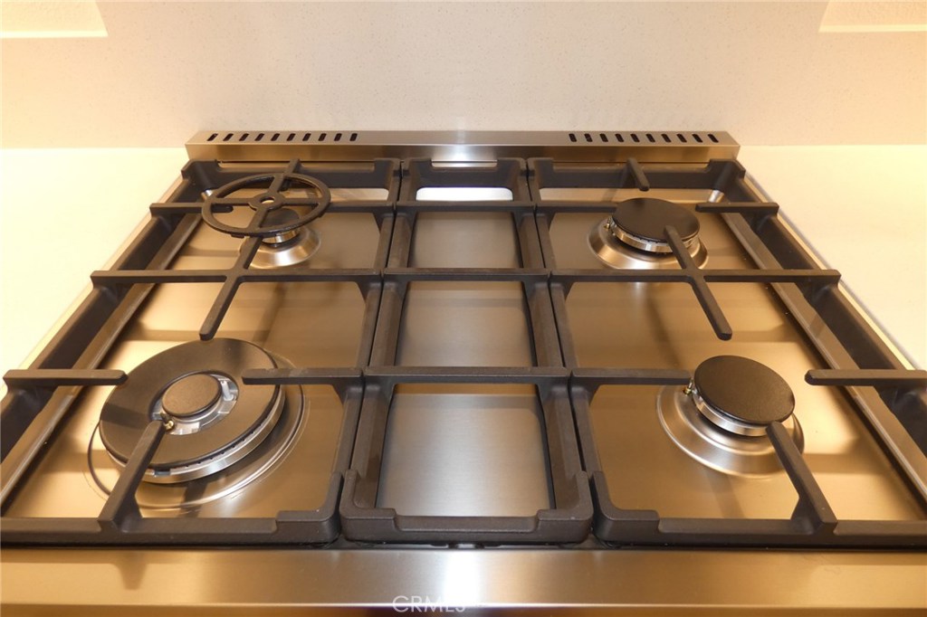 142 Anthology Irvine, CA 92618 - Photo 14 of 40 a close view of water heater and stove