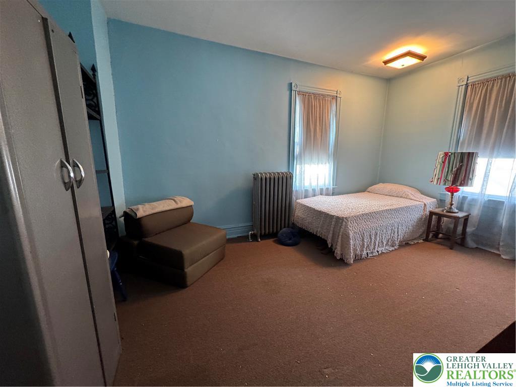 9 North 4th Street Coplay, PA 18037 - Photo 11 of 17 a bedroom with bed and a window