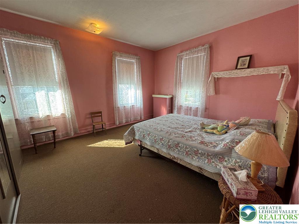 9 North 4th Street Coplay, PA 18037 - Photo 14 of 17 a bedroom with a bed and a window