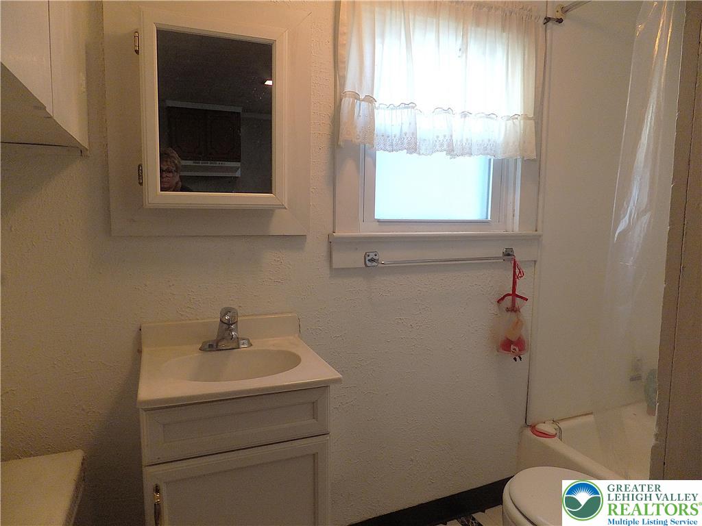 9 North 4th Street Coplay, PA 18037 - Photo 9 of 17 a bathroom with a sink window and toilet