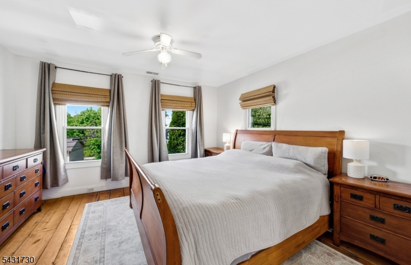 105 Main Street Lebanon, NJ 08833 - Photo 13 of 25 a bed room with a bed and a window