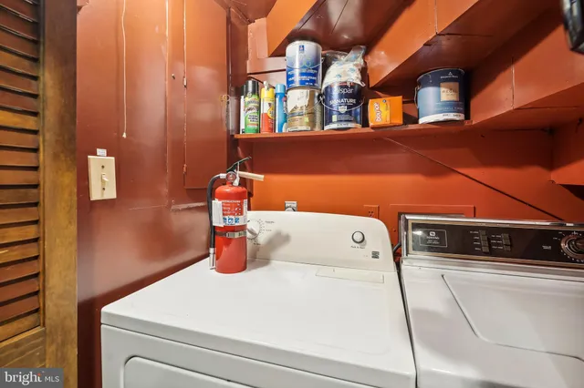a utility room with dryer and washer