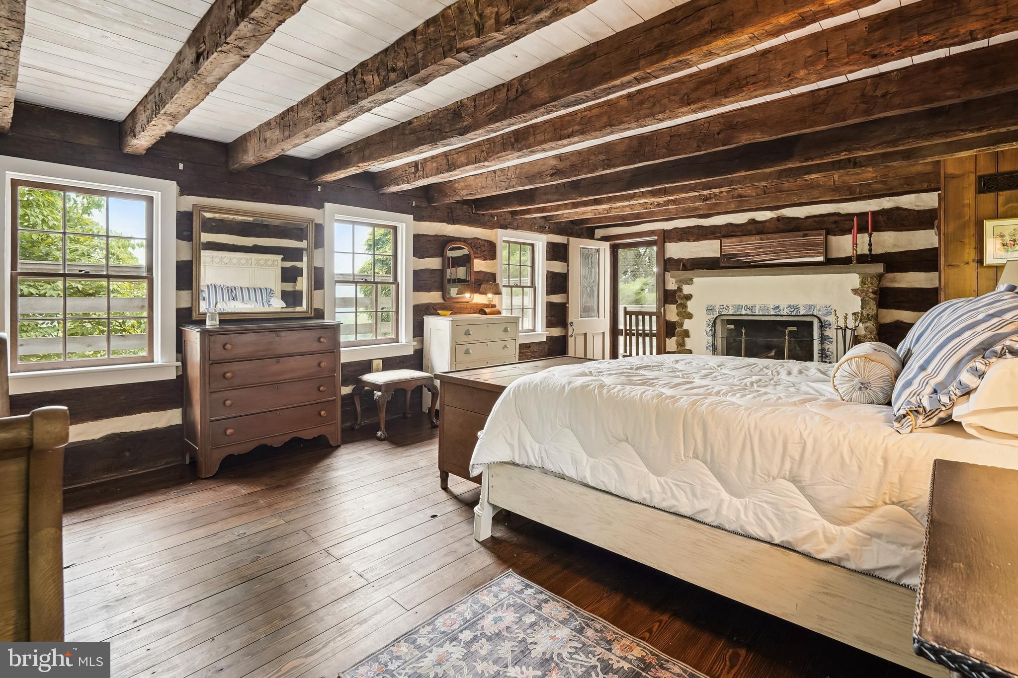 18285 Foundry Road Purcellville, VA 20132 - Photo 25 of 53 a bedroom with a bed and wooden floor