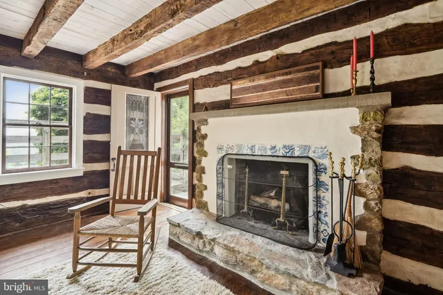 a view of balcony with wooden floor and fence