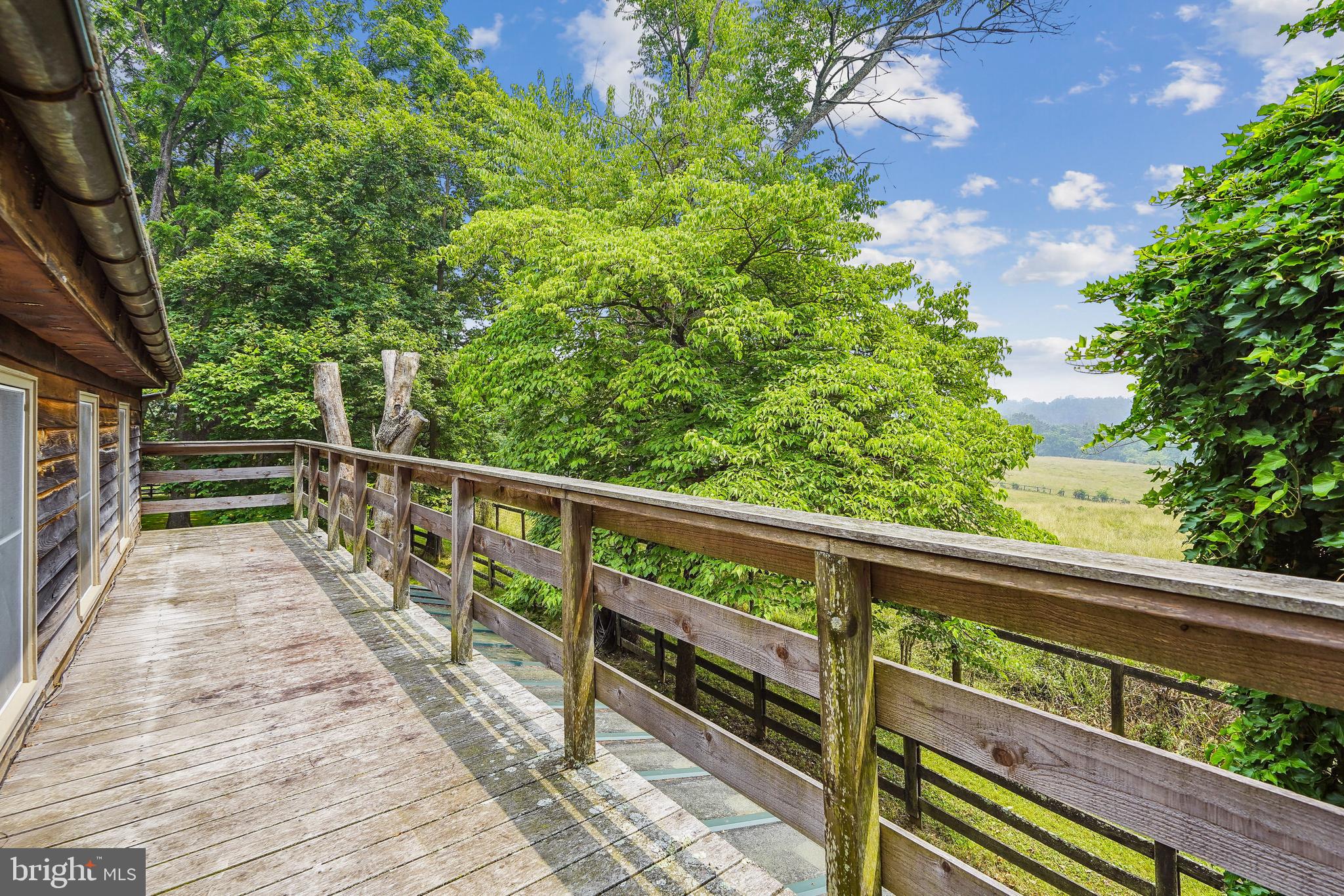 18285 Foundry Road Purcellville, VA 20132 - Photo 27 of 53 a view of balcony with wooden floor and fence