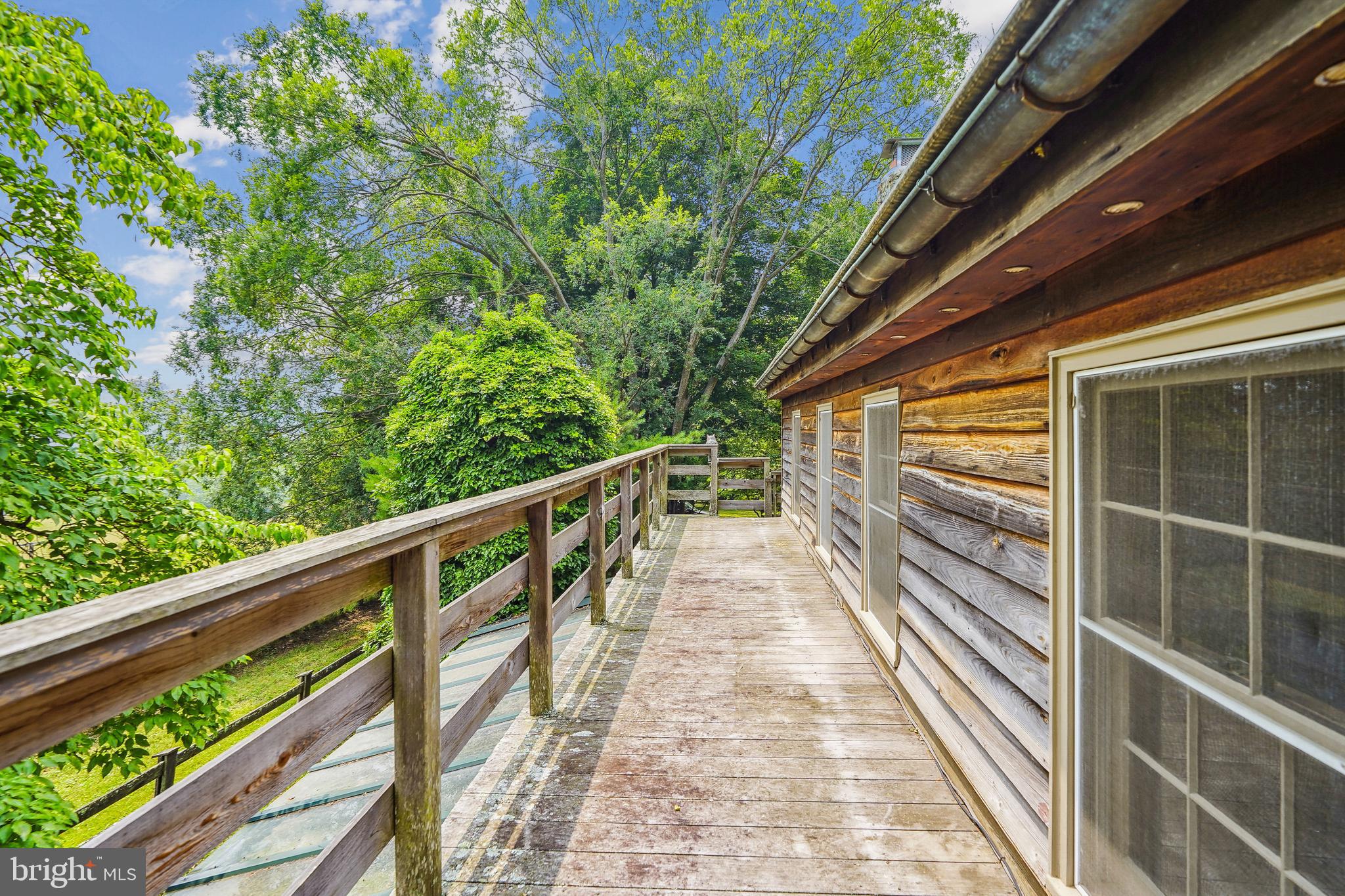 18285 Foundry Road Purcellville, VA 20132 - Photo 28 of 53 a view of balcony with wooden floor and fence