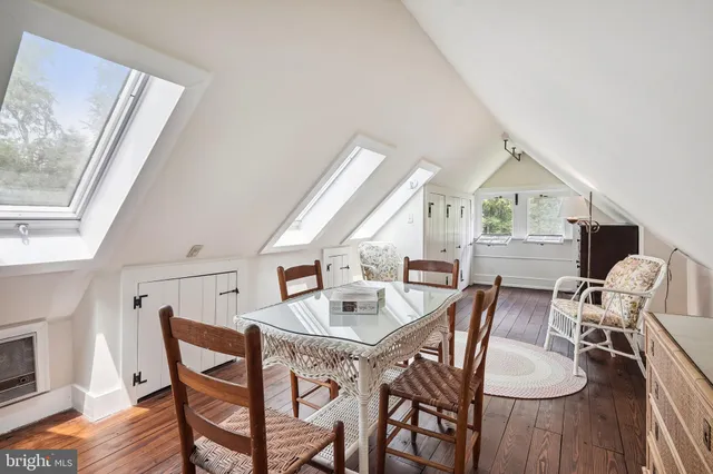 a backyard of a house with lots of green space and trees