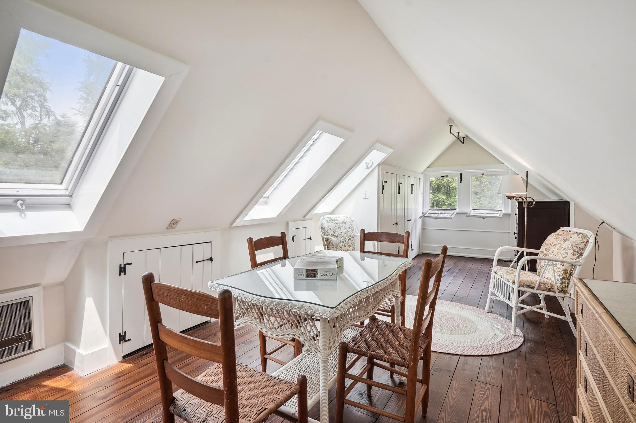 18285 Foundry Road Purcellville, VA 20132 - Photo 38 of 53 a view of a dining room with furniture and wooden floor