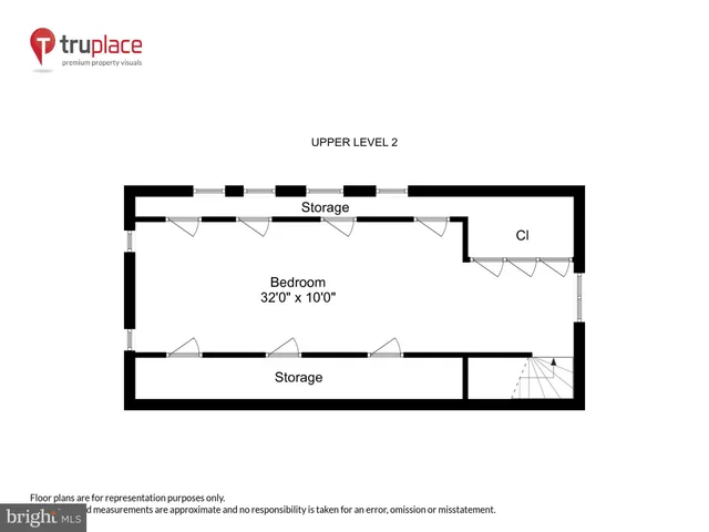 a view of a park with a tree in the background