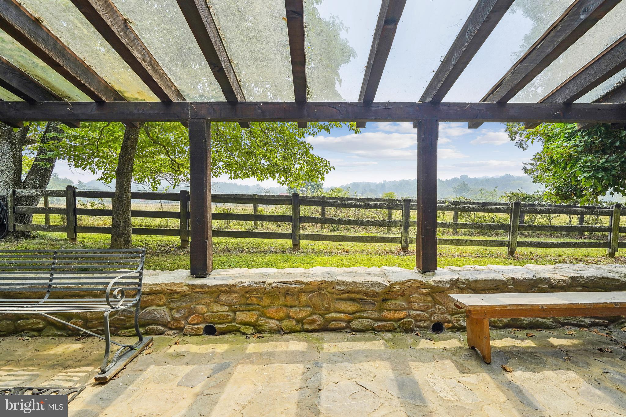 18285 Foundry Road Purcellville, VA 20132 - Photo 4 of 53 a view of swimming pool with a backyard