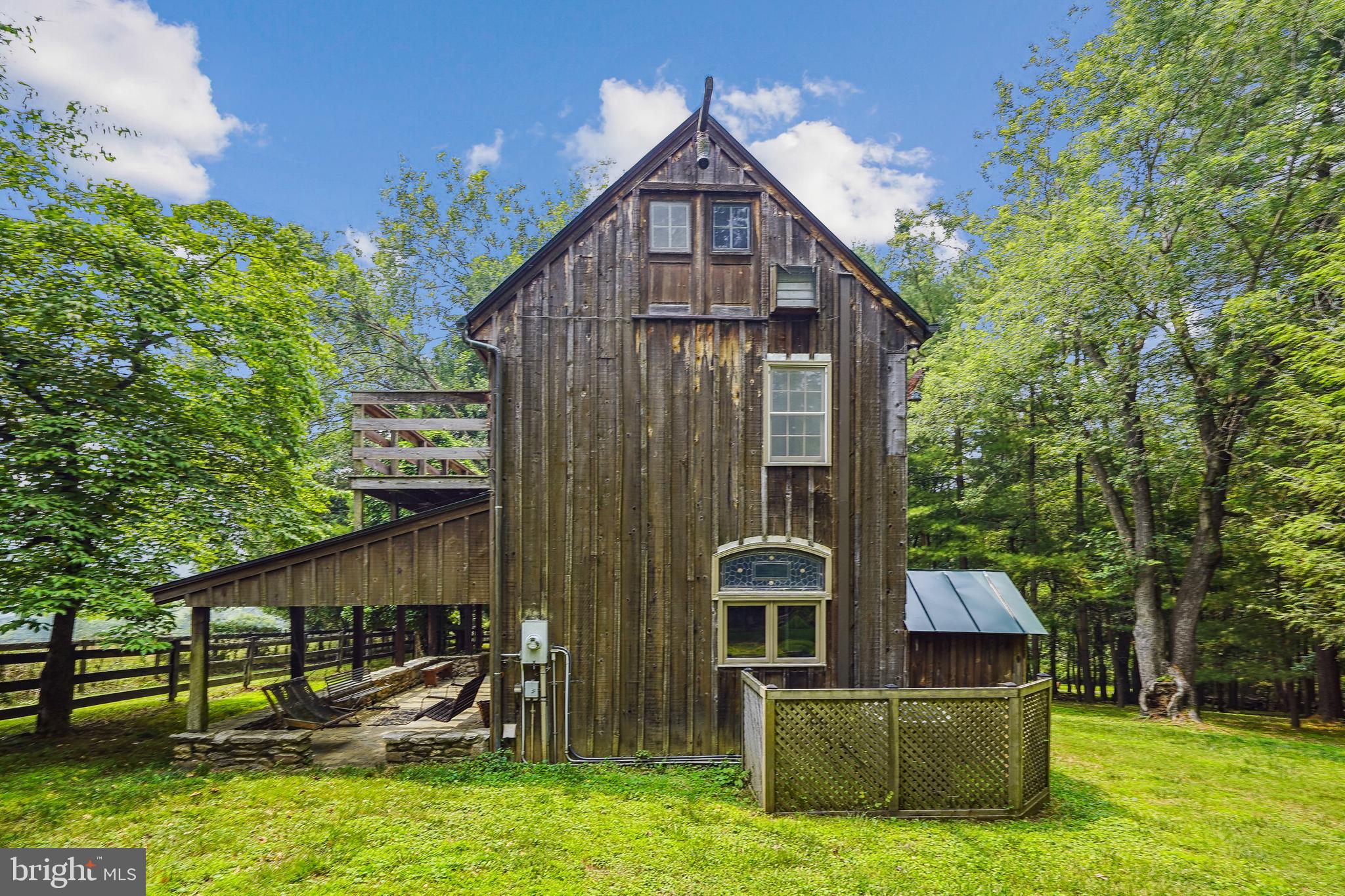18285 Foundry Road Purcellville, VA 20132 - Photo 45 of 53 a view of a house with backyard and porch