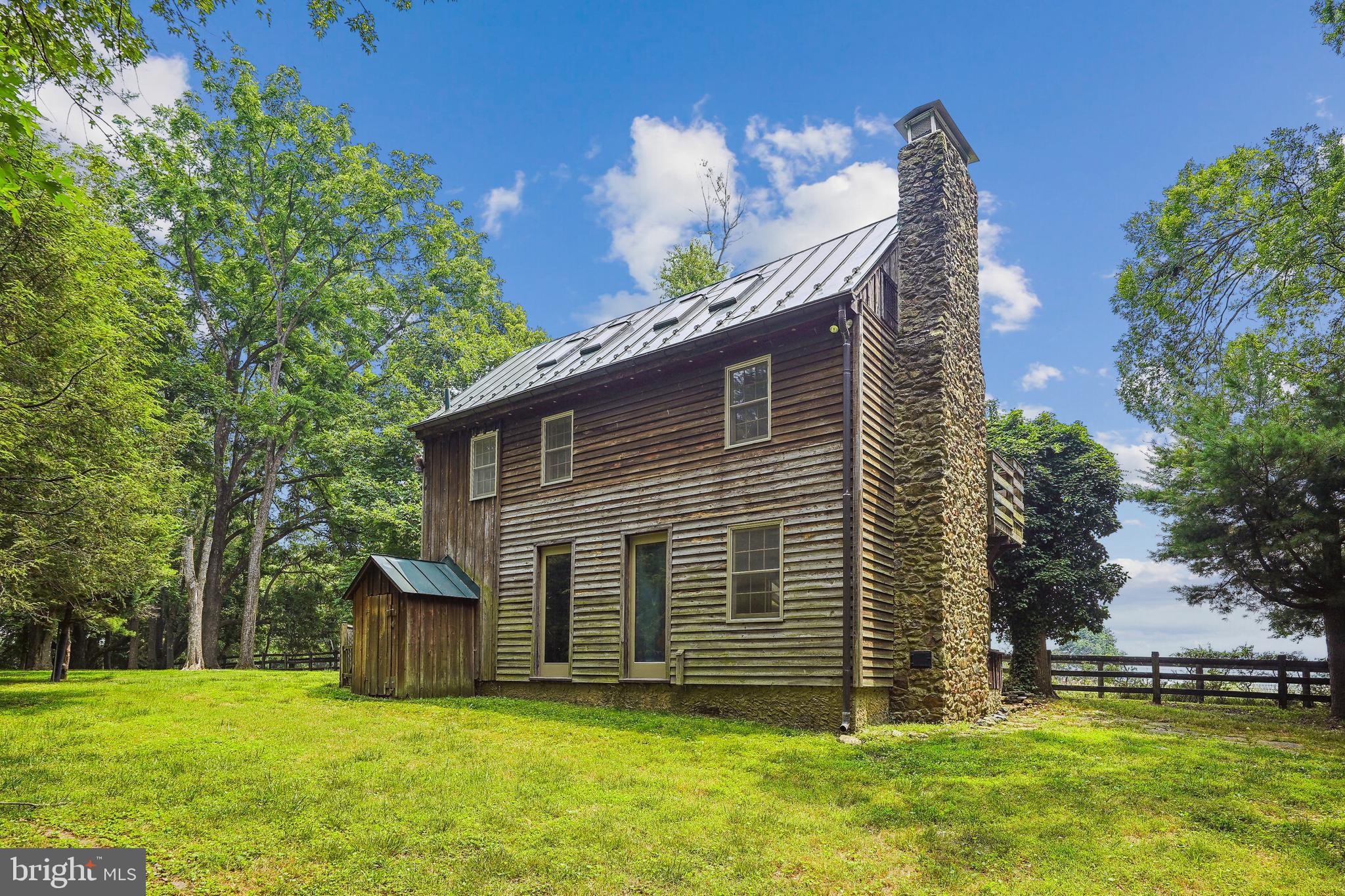 18285 Foundry Road Purcellville, VA 20132 - Photo 50 of 53 a view of a house with a yard