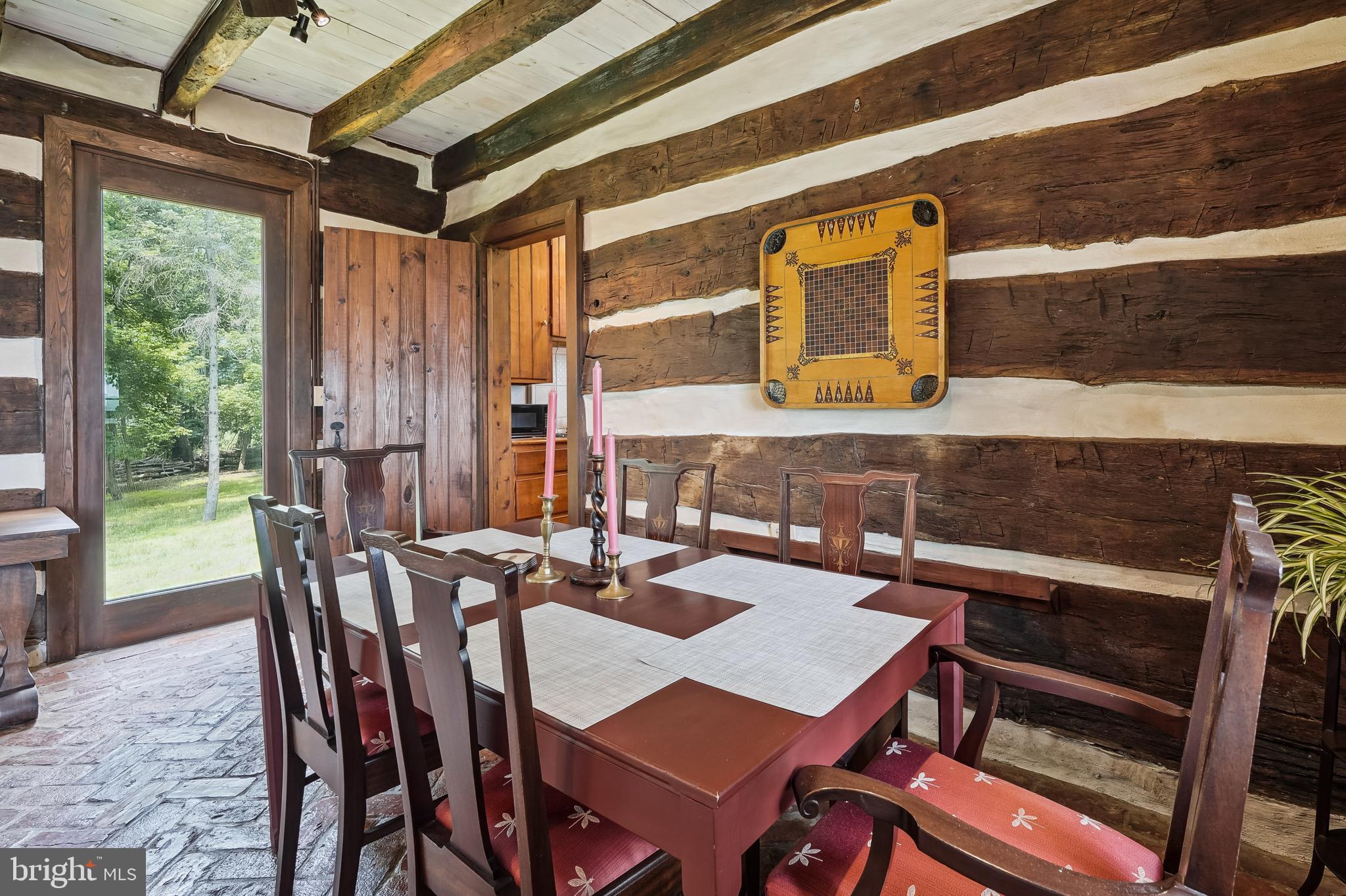 18285 Foundry Road Purcellville, VA 20132 - Photo 10 of 53 a view of a patio with table and chairs
