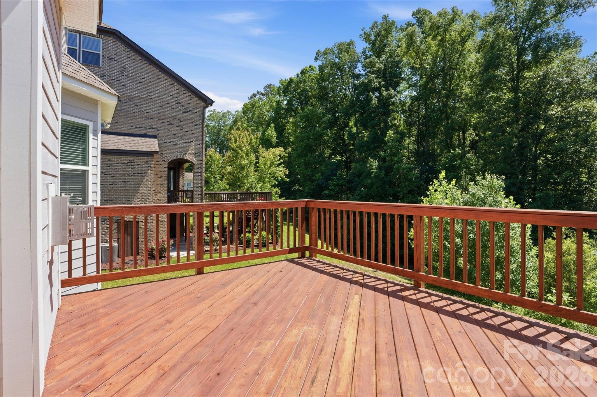 14022 Salem Ridge Road Huntersville, NC 28078 - Photo 6 of 38 a balcony with view of trees in the background