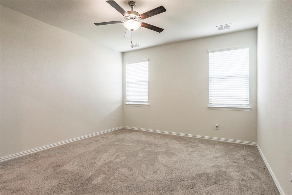 652 Ridgeback Trail Fort Worth, TX 76052 - Photo 13 of 20 Unfurnished room featuring light carpet and ceiling fan