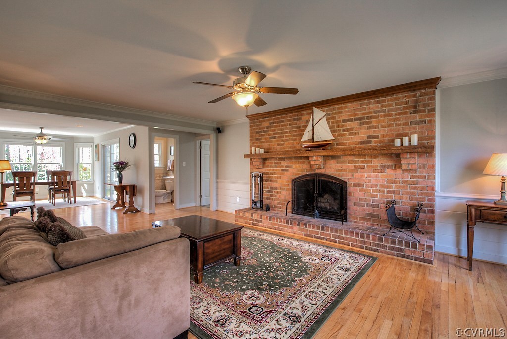 2252 Banstead Road Midlothian, VA 23113 - Photo 13 of 50 a living room with furniture and a fireplace