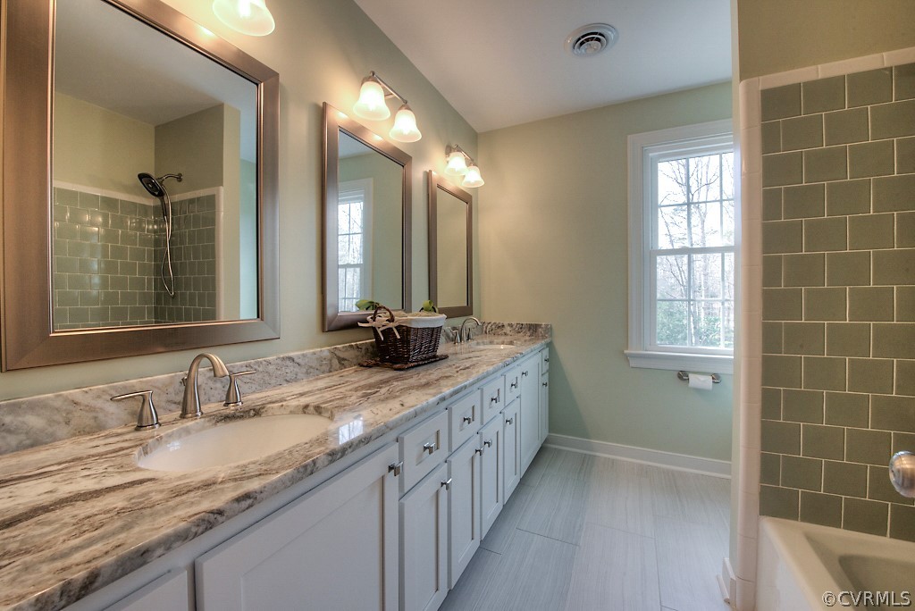 2252 Banstead Road Midlothian, VA 23113 - Photo 33 of 50 a bathroom with a granite countertop sink mirror and double