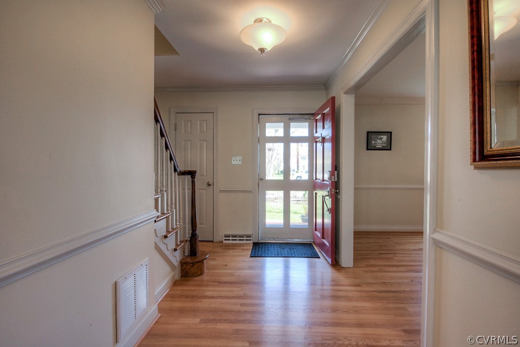 2252 Banstead Road Midlothian, VA 23113 - Photo 4 of 50 a view of empty room with wooden floor and fan