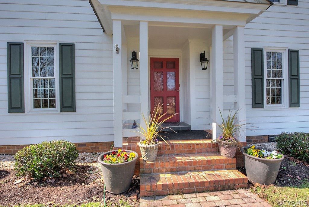 2252 Banstead Road Midlothian, VA 23113 - Photo 45 of 50 a front view of a house with outdoor seating