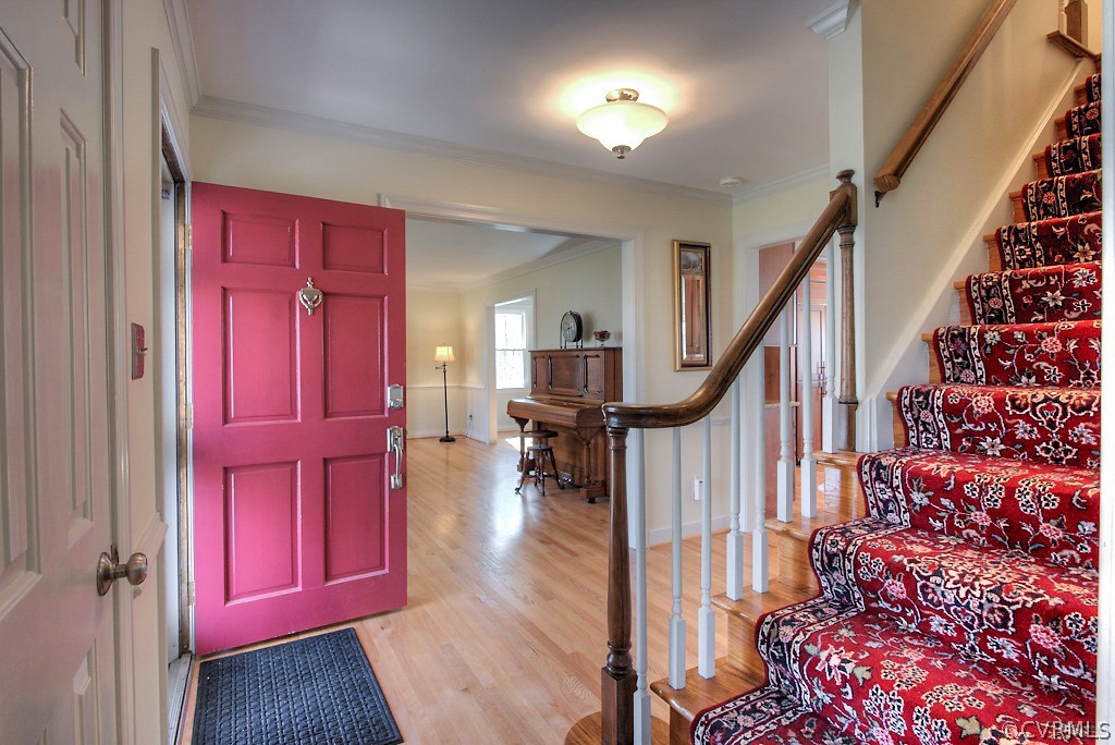 2252 Banstead Road Midlothian, VA 23113 - Photo 6 of 50 a view of entryway with wooden floor and stairs
