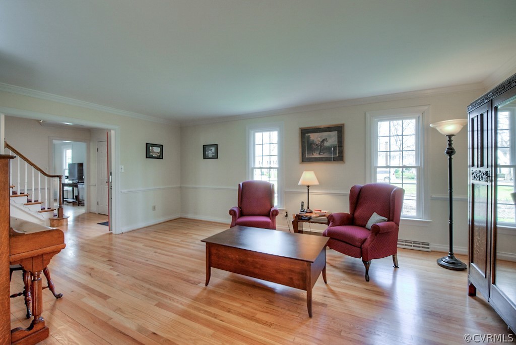 2252 Banstead Road Midlothian, VA 23113 - Photo 9 of 50 a living room with furniture rug and wooden floor