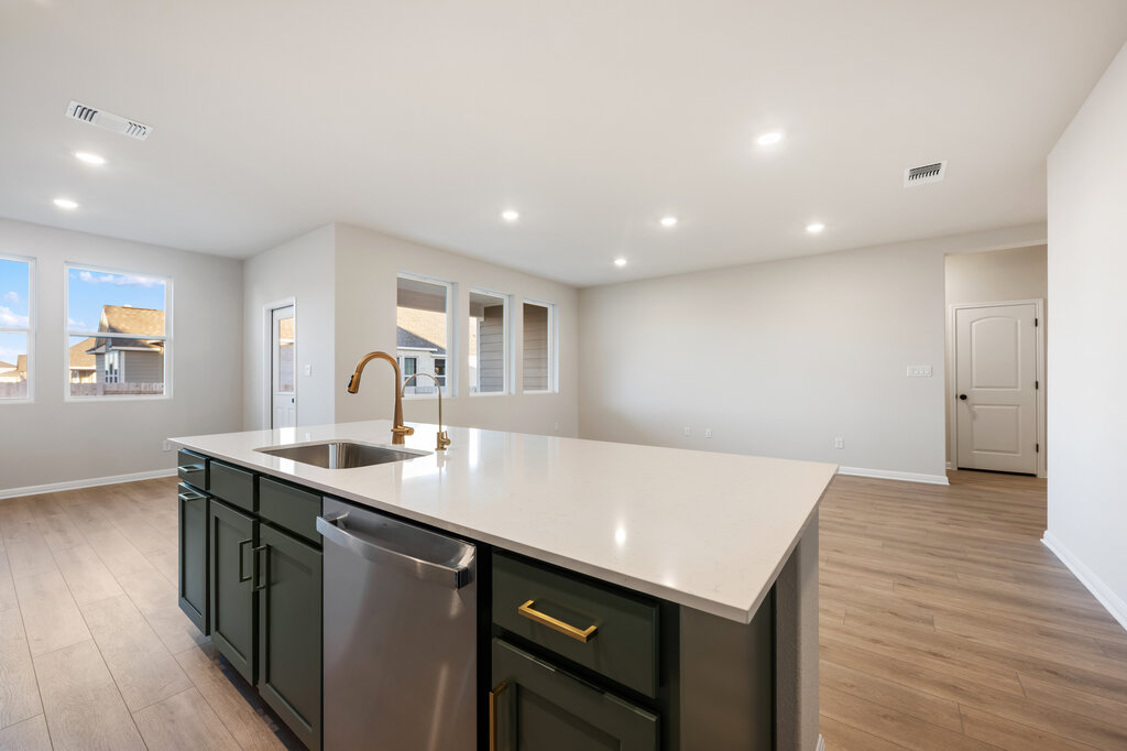 2509 Walking Y Road Georgetown, TX 78633 - Photo 24 of 40 a kitchen with a sink a counter space and wooden floor