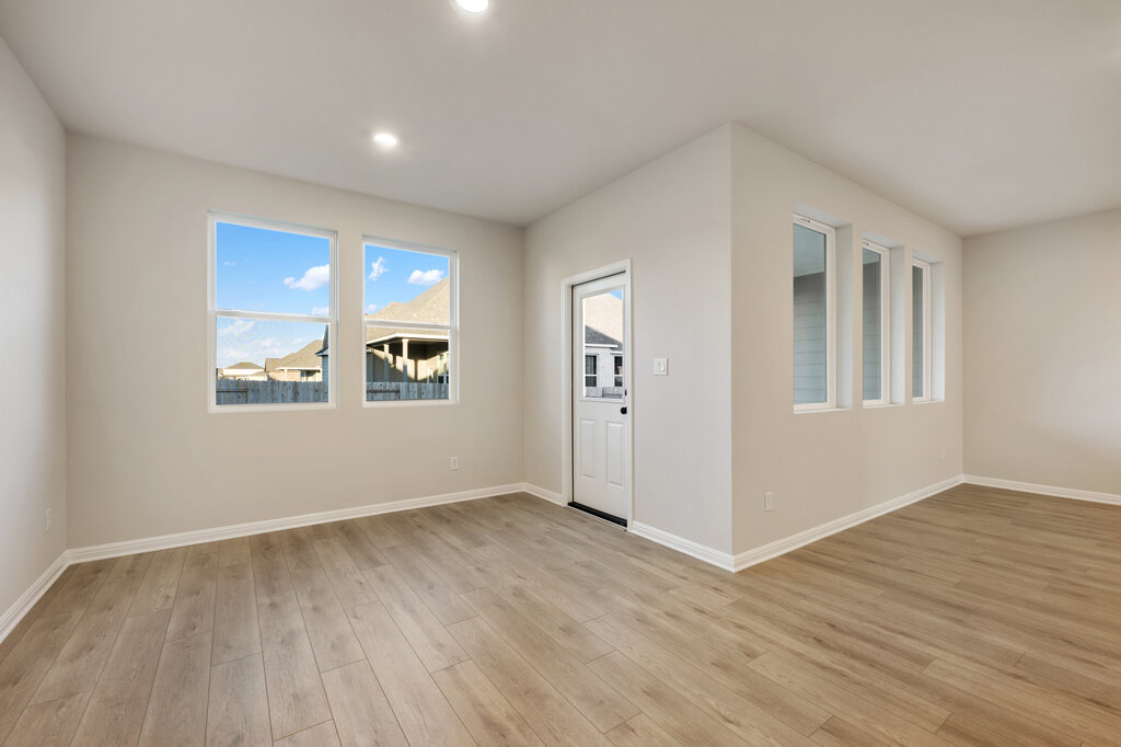 2509 Walking Y Road Georgetown, TX 78633 - Photo 26 of 40 a view of an empty room with window and wooden floor