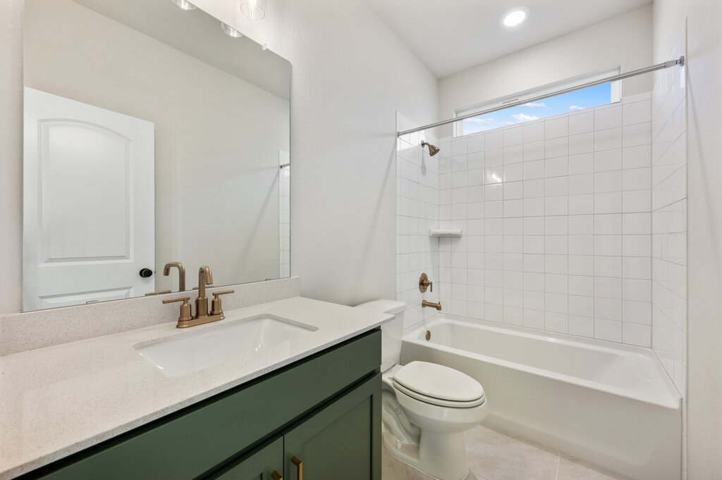 2509 Walking Y Road Georgetown, TX 78633 - Photo 5 of 40 a bathroom with a sink a toilet and shower