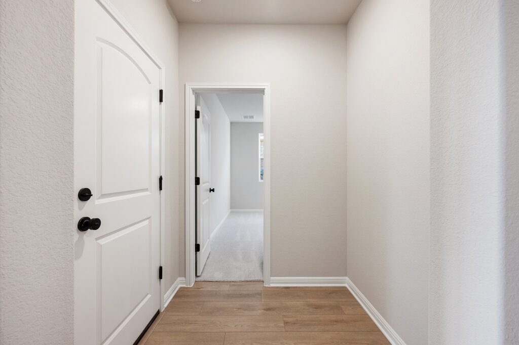 2509 Walking Y Road Georgetown, TX 78633 - Photo 8 of 40 a view of a bathroom from a hallway