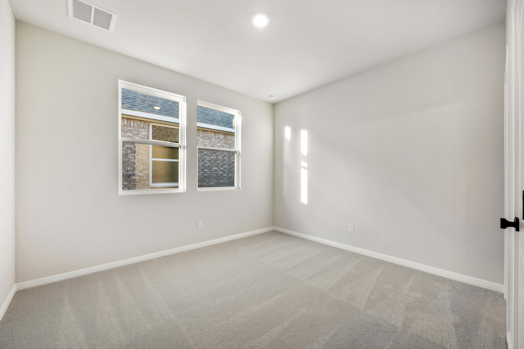 2509 Walking Y Road Georgetown, TX 78633 - Photo 9 of 40 an empty room with windows