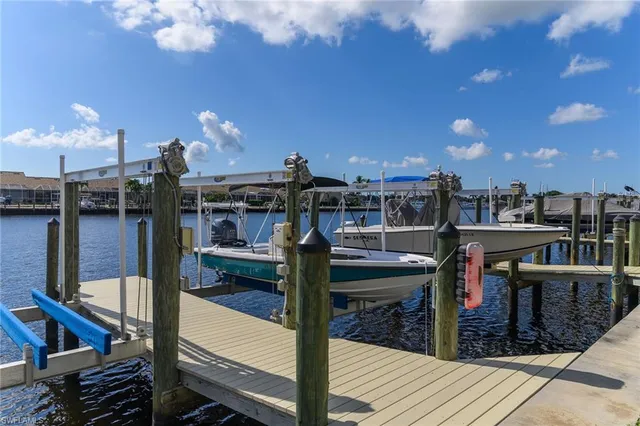 a view of a balcony with sitting area