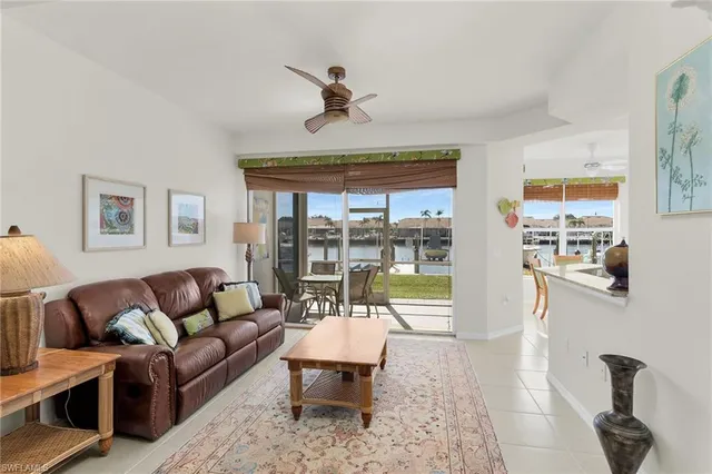 a kitchen with a sink a stove and cabinets