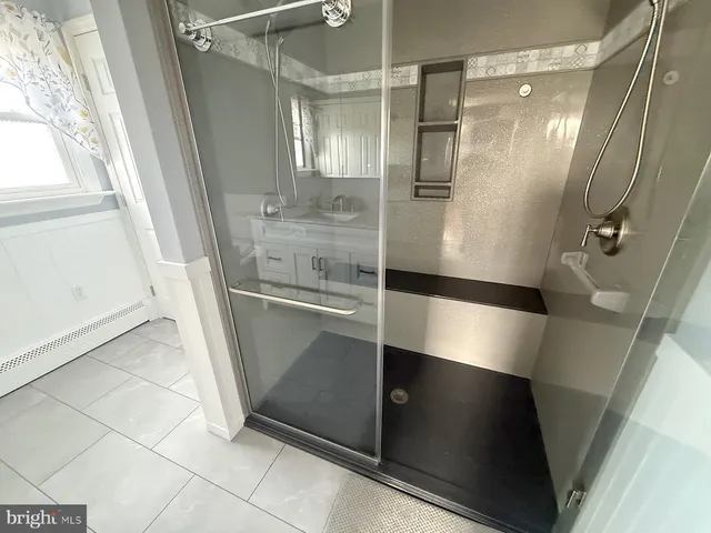 a view of storage and utility room with a sink